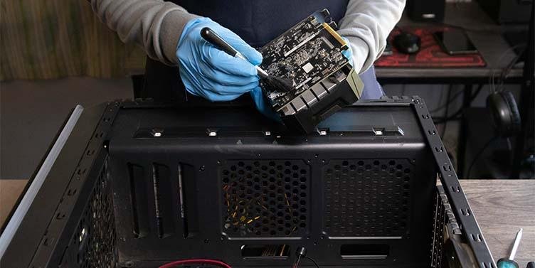 Technician performing PC repair